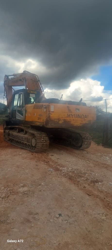 Excavator in rough terrain